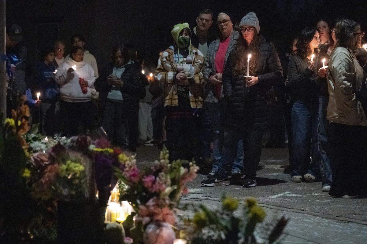 Neighbors gather for a vigil on Mill Water Circle in Rancho Cordova on Sunday, Feb. 1, 2026, to remember Lindsey Peralta Vallerga, her son, Colton Drake Peralta Vallerga, and her daughter, Sydney Anne Peralta Vallerga, who were found dead in their home on Jan. 27.