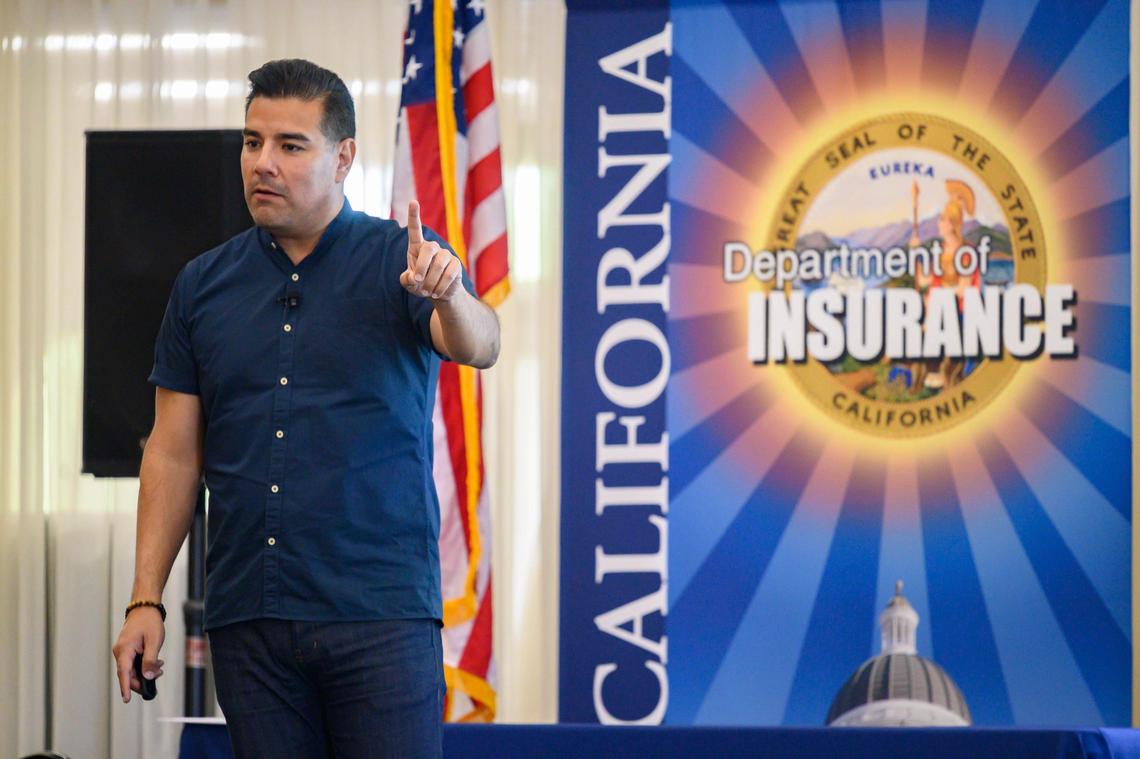 California Insurance Commissioner Ricardo Lara speaks to an overflow crowd at a town hall meeting in Grass Valley, Thursday, August 22, 2019, to address the concerns of local residents after a rise in homeowners insurance premiums and non-renewal letters due to recent California wildfires.