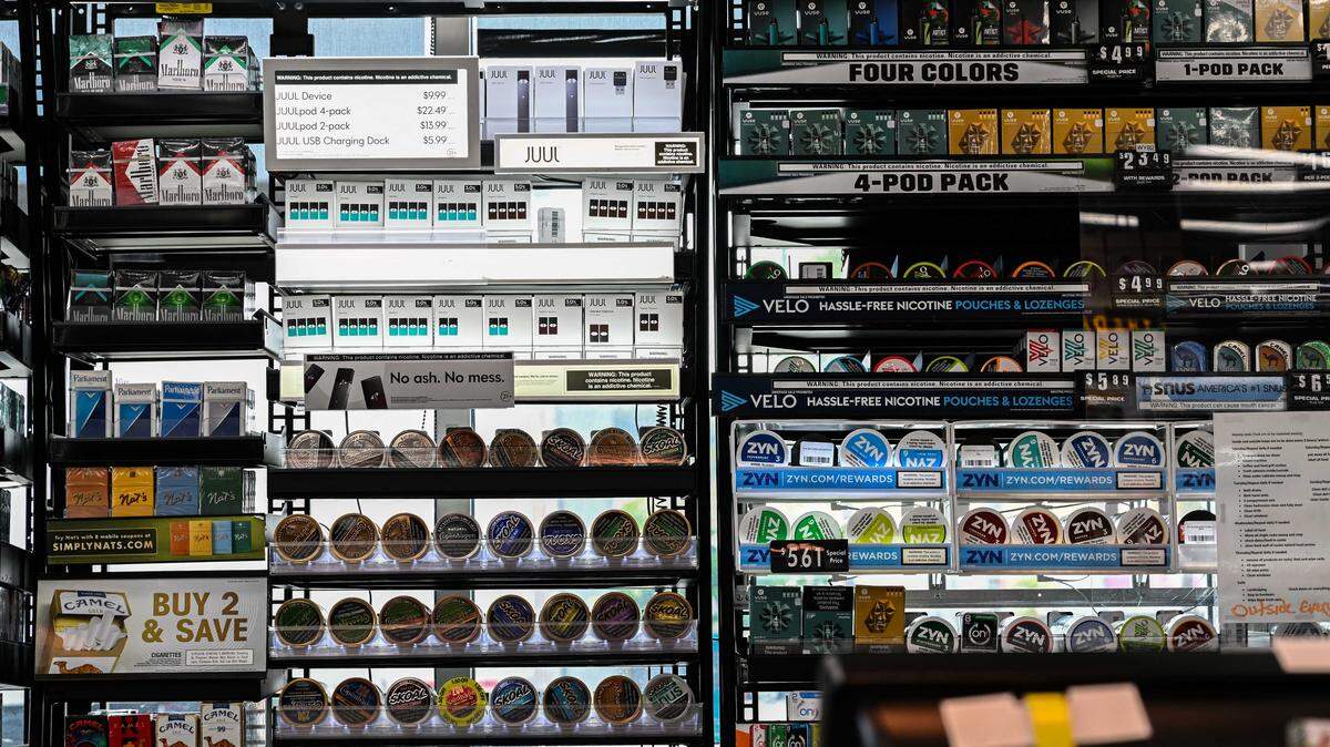 Tobacco, including cigarettes and vaping e-cigarette products, are displayed in a convenience store in El Segundo in 2022. Lincoln city officials are considering new regulations on tobacco and vape retailers aimed at limiting youth access to such products.