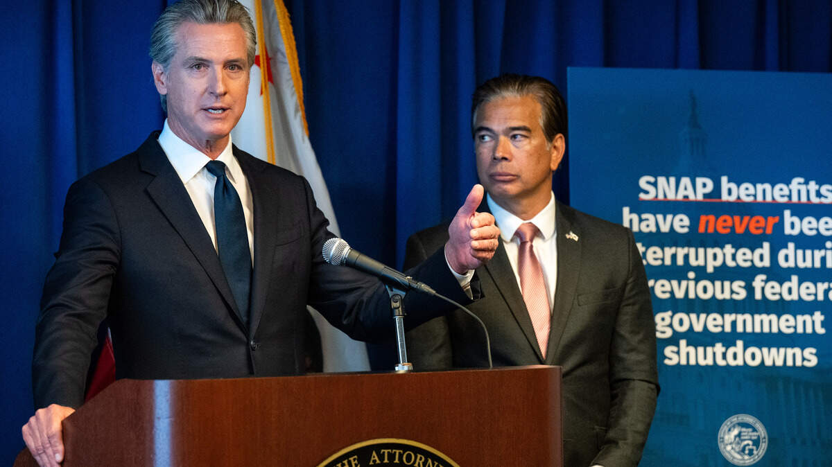 Gov. Gavin Newsom and Attorney General Rob Bonta, speak at an October news conference in Sacramento about their lawsuit to restore funding to the Supplemental Nutrition Assistance Program during the shutdown. Newsom and Bonta filed separate lawsuit Tuesday against the Trump administration over cuts to a federal housing grant program.