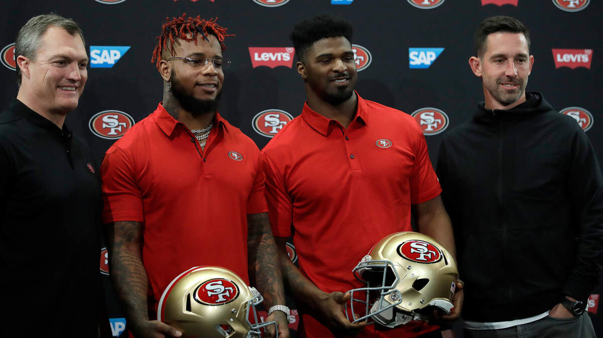 From left, 49ers general manager John Lynch, Kwon Alexander, Dee Ford and coach Kyle Shanahan after a news conference March 14 in Santa Clara.