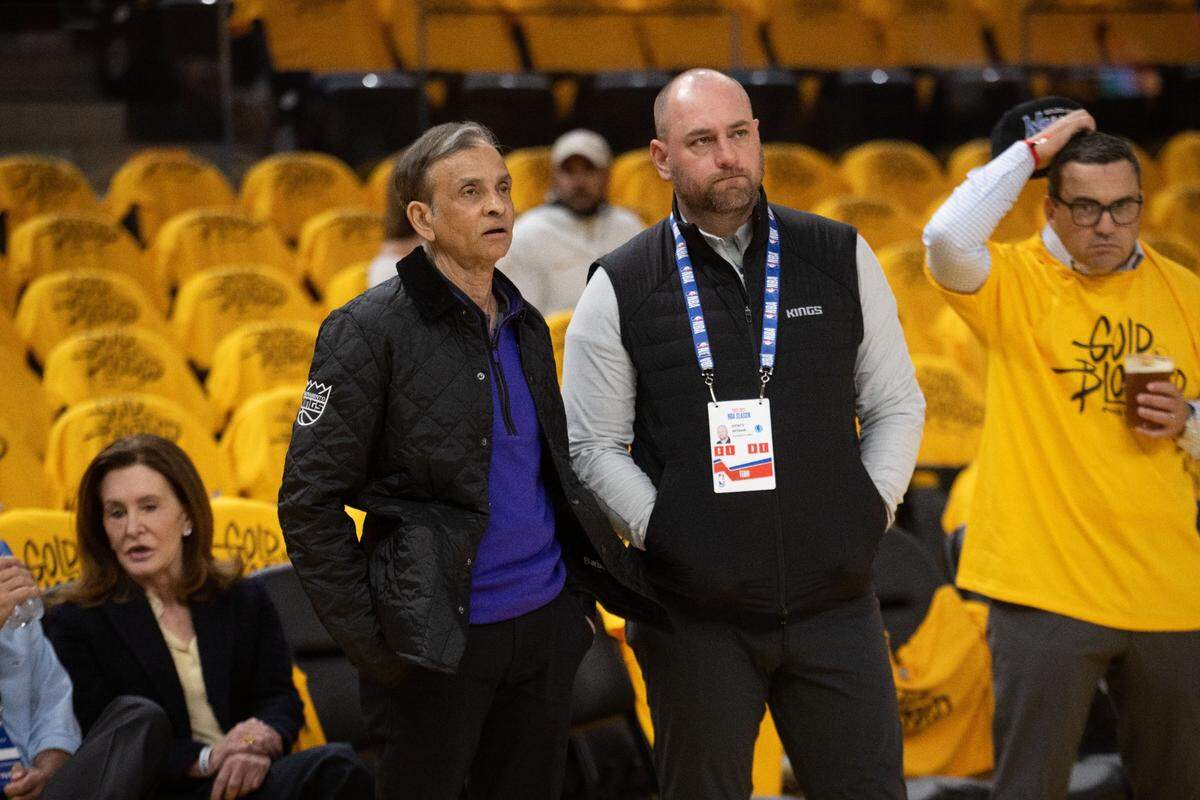 Sacramento Kings majority owner Vivek Ranadivé and general manager Monte McNair stand courtside before Game 6 of the first-round NBA playoff series against the Golden State Warriors on Friday, April 28, 2023, at Chase Center in San Francisco.