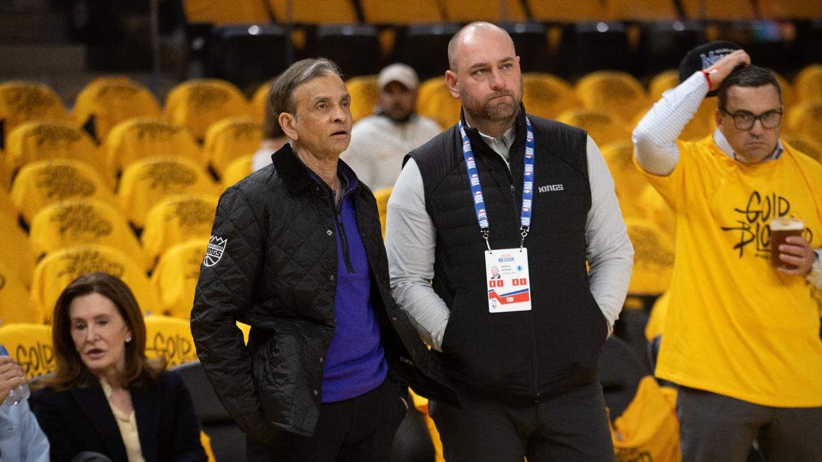 Sacramento Kings majority owner Vivek Ranadivé and General Manager Monte McNair stand courtside before Game 6 of the first-round NBA playoff series at Chase Center on Friday, April 28, 2023.