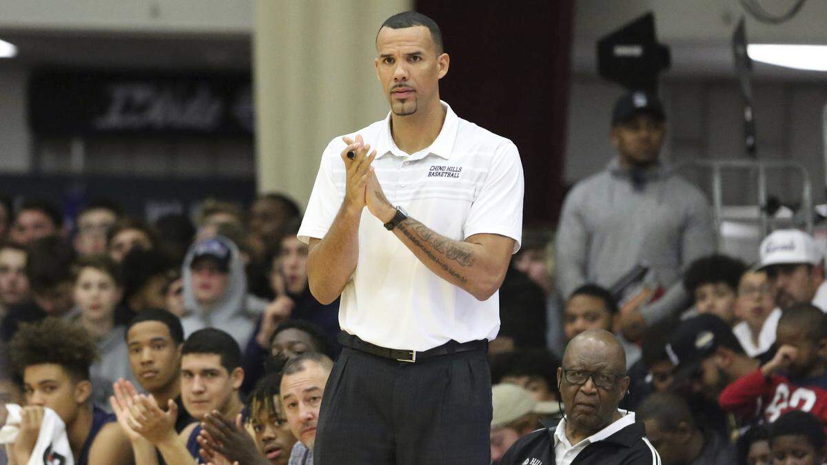 Chino Hills coach Dennis Latimore is seen on the sidelines against Spartanburg Day during a high school basketball game at the Hoophall Classic, January 13, 2018, in Springfield, Mass.