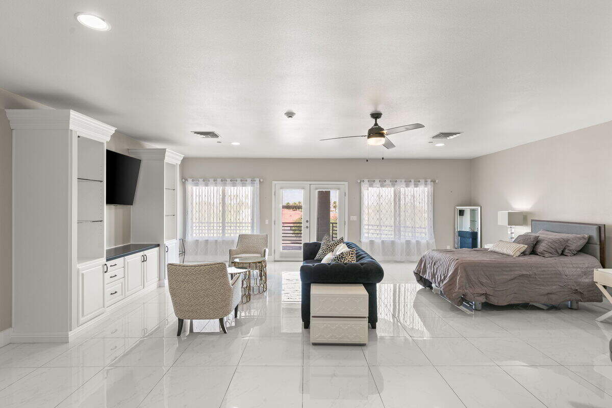 On the market for $12 million, the estate features 12 suites, each with spa-like bathrooms and expansive living areas designed to offer both privacy and comfort.