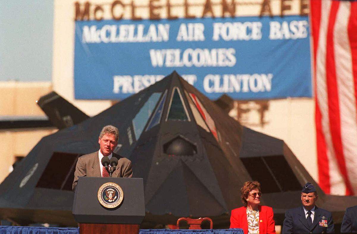 President Bill Clinton speaks to the crowd gathered at McClellan Air Force Base in North Highlands with a F-117 Nighthawk stealth fighter on May 10, 1995.