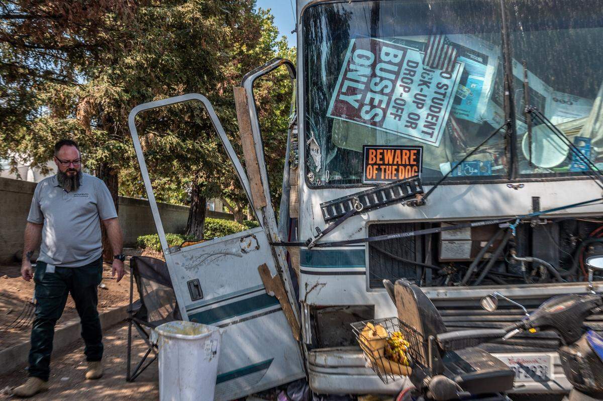 Nathan Cox, a member of the city of Sacramento’s new Department of Community Response, leaves Wednesday after checking up on a man who called 311 but said he did not need help.