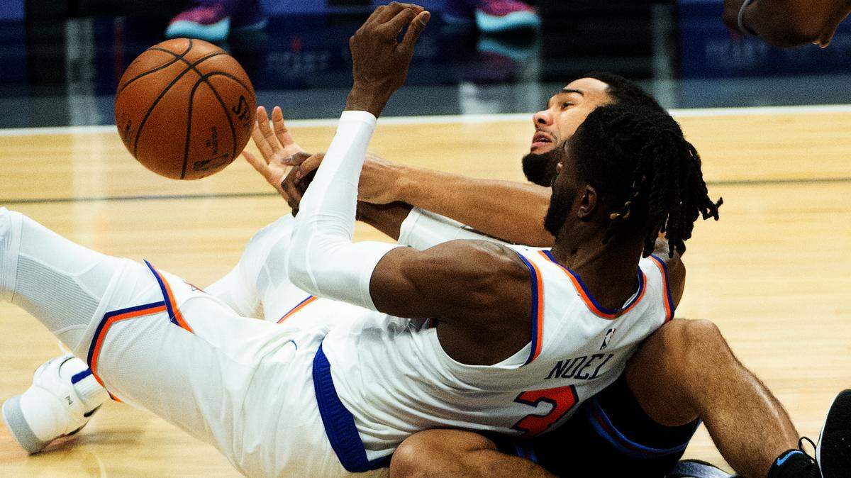 Sacramento Kings guard Cory Joseph (9) battled New York Knicks center Nerlens Noel (3) for a loose ball during a game in January in Sacramento.