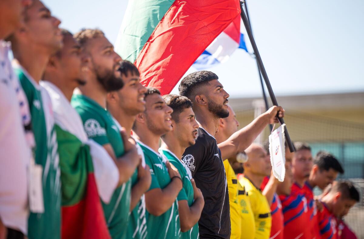 The Bulgarian men’s team sing their national anthem as they prepare to face Costa Rica on the final day of play at the Homeless World Cup on Saturday, July 15, 2023, at Hornet Stadium at Sacramento State.
