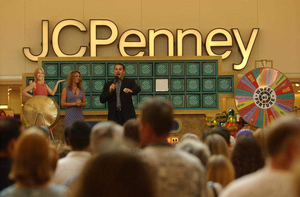 Wheel of Fortune host David Sidoni and letter turner Holly Brooks talk to hundreds of people who showed up at Sunrise Mall in Citrus Heights to audition for the television game show in 2003.