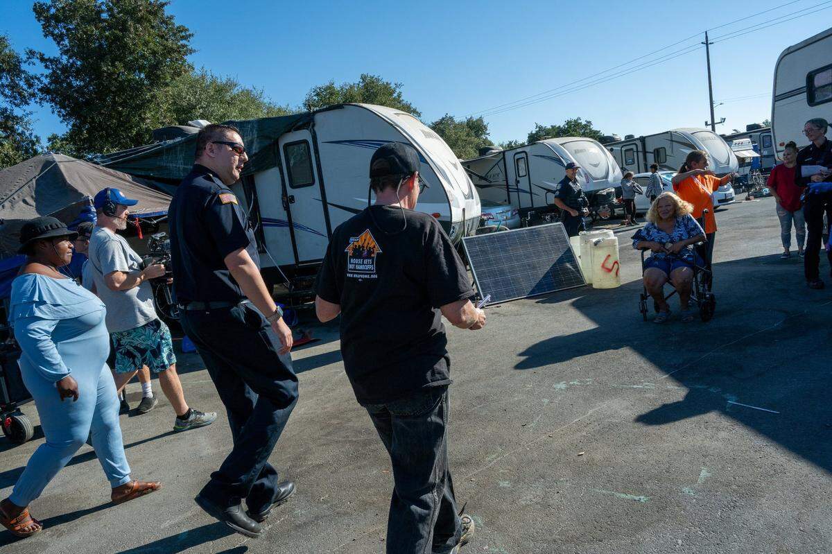 Sacramento Fire Marshal Jason Lee tells Sharon Jones, co-founder of Camp Resolution, on Friday, Aug. 9, 2024, that he is happy with the progress they have made since the inspection two weeks ago. “It’s a tremendous a lot of work being done here. The area has been cleared up a lot,” said Lee.