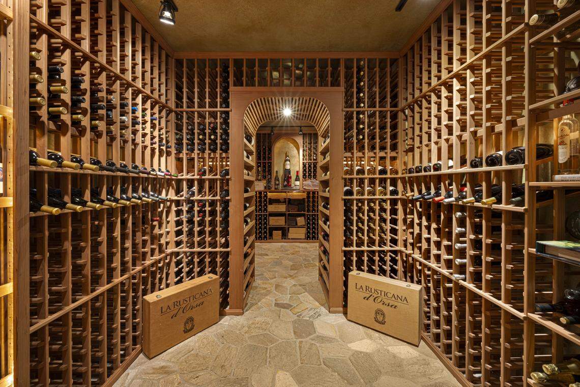 A stone-built wine house accommodates nearly 4,000 more bottles, with redwood shelving, mood lighting and a private tasting patio overlooking the spring-fed pond.