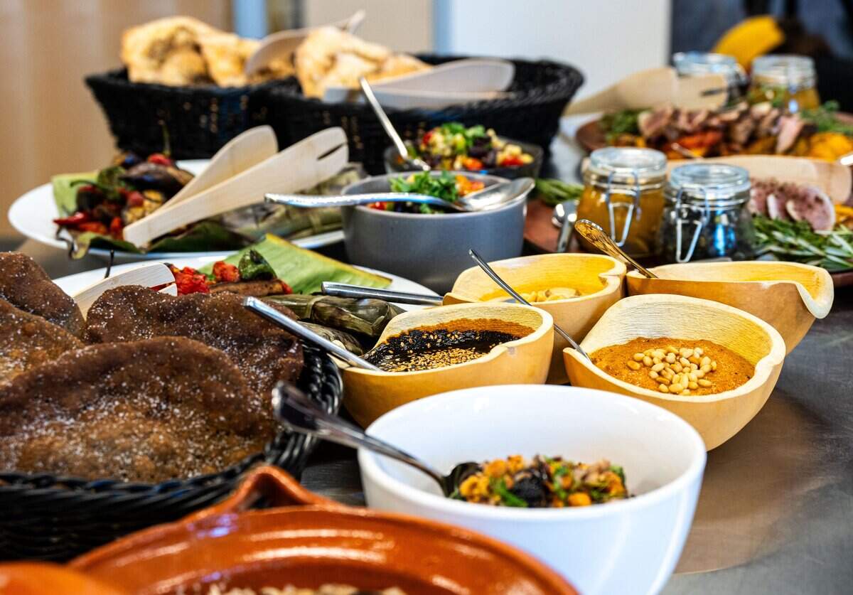 The three-course meal of ash-crusted albacore, blue corn rabbit tamales and braised California bison are presented at a preview for the Tower Bridge Dinner on Monday.