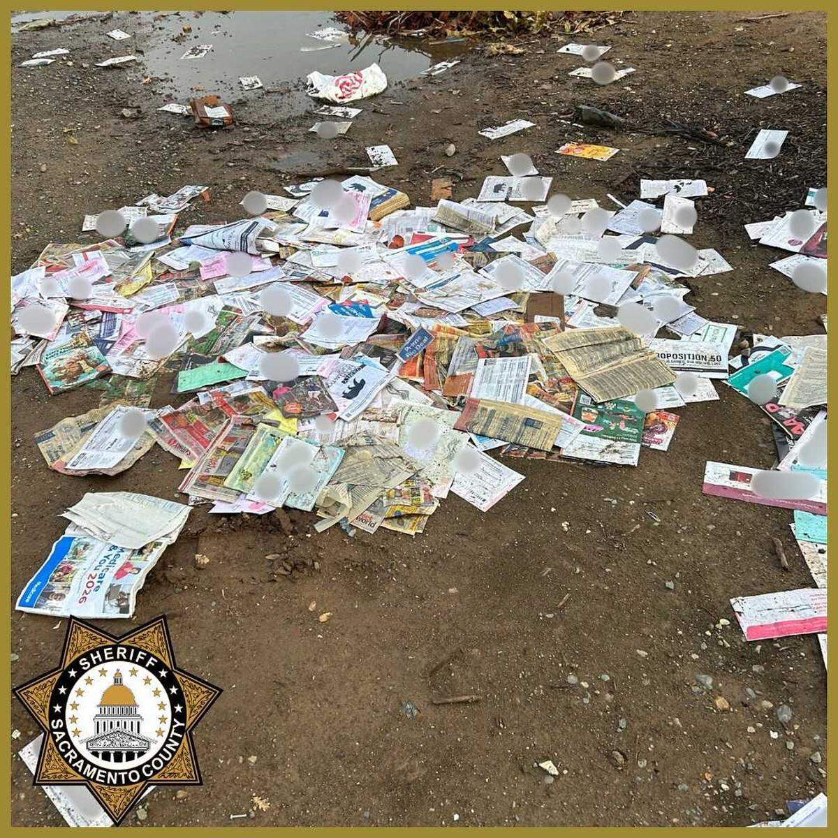 Sheriff's deputies on Wednesday Oct. 15, 2025, found about 100 election ballots in a large pile of mail at a homeless encampment near Elder Creek and Mayhew roads in rural Sacramento County.