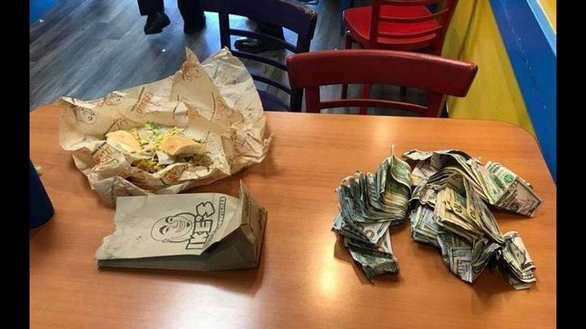 Marcus Trujillo, 47, robbed a Wells Fargo Bank branch in Salinas, California, on Monday, police say. An off-duty officer spotted him eating a sandwich and counting his cash at an eatery two hours later, resulting in his arrest.