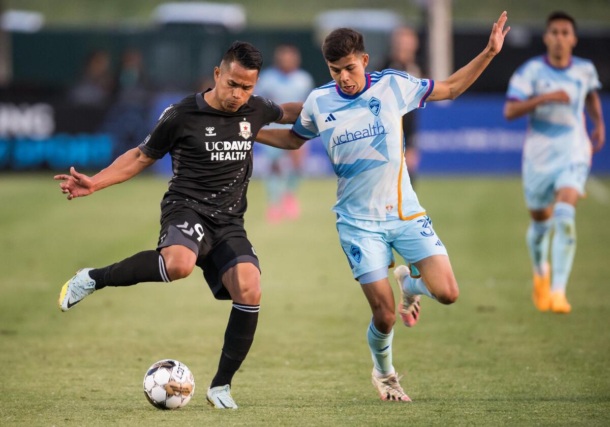 Sacramento Republic FC forward Sebastian Herrera (9) keeps the ball away from Colorado Rapids defender Anthony Markanich (31) during the first half of the U.S. Open Cup Round of 32 soccer match Tuesday, May 9, 2023, at Heart Health Park in Sacramento.