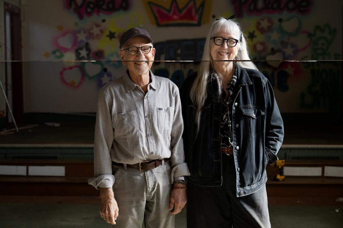 Neighbors Jack Nielsen and Kim Scott, who serve as co-chairs of the Old North Sacramento Restoration Committee, pose for a portrait inside the Old North Sacramento School on Feb. 2.