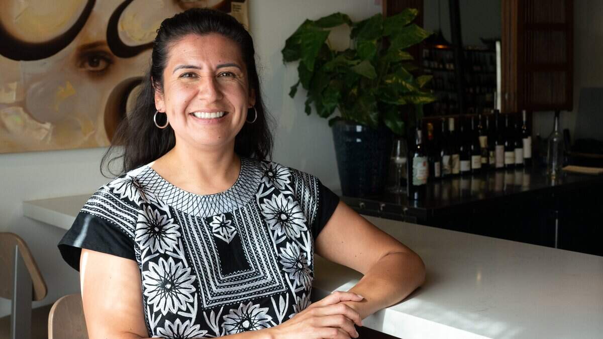 Melissa Sanchez, owner of Alma Wine Bar & Shop in Sacramento, poses for a portrait at the establishment on Wednesday, June 24, 2026.