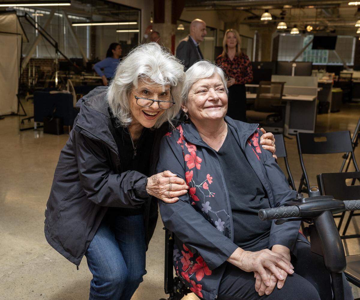 Maria Kelly, left, poses with former Sacramento mayor Heather Fargo during a Q&A event with Sacramento Mayor Kevin McCarty and City Manager Maraskeshia Smith at The Sacramento Bee’s offices on Thursday, March 26, 2026.