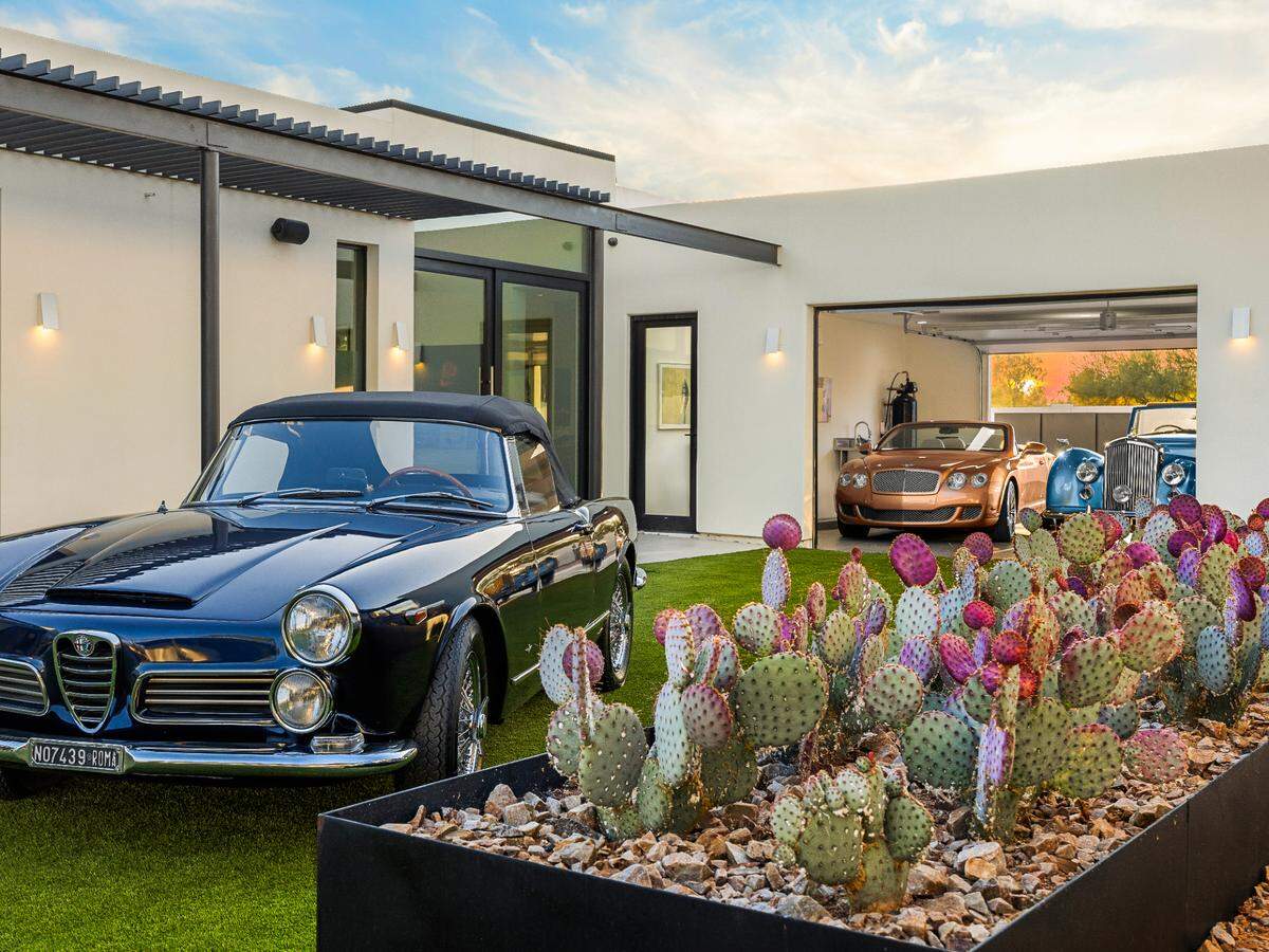 The $7.8 million listing is a must-see for car collectors.
