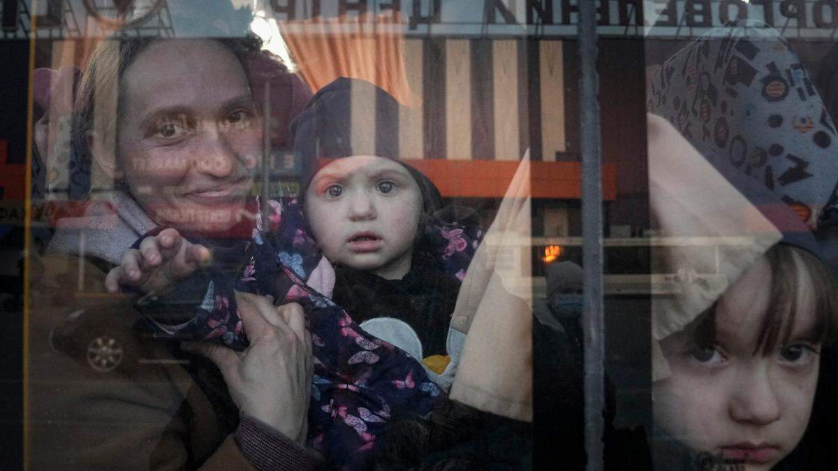 Displaced people in a bus at a refugee center in Zaporizhia, Ukraine, in March.