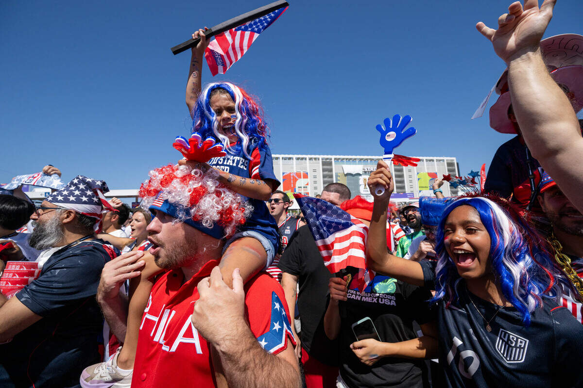 USA fan Izzy Ferguson, 9, sits on the shoulders of her father, Patrick Ferguson, alongside her sister, Gianna Gomes, 13, before the FIFA World Cup 2026 Round of 32 match between the United States and Bosnia-Herzegovina at Levi's Stadium on Wednesday, July 1, in Santa Clara.