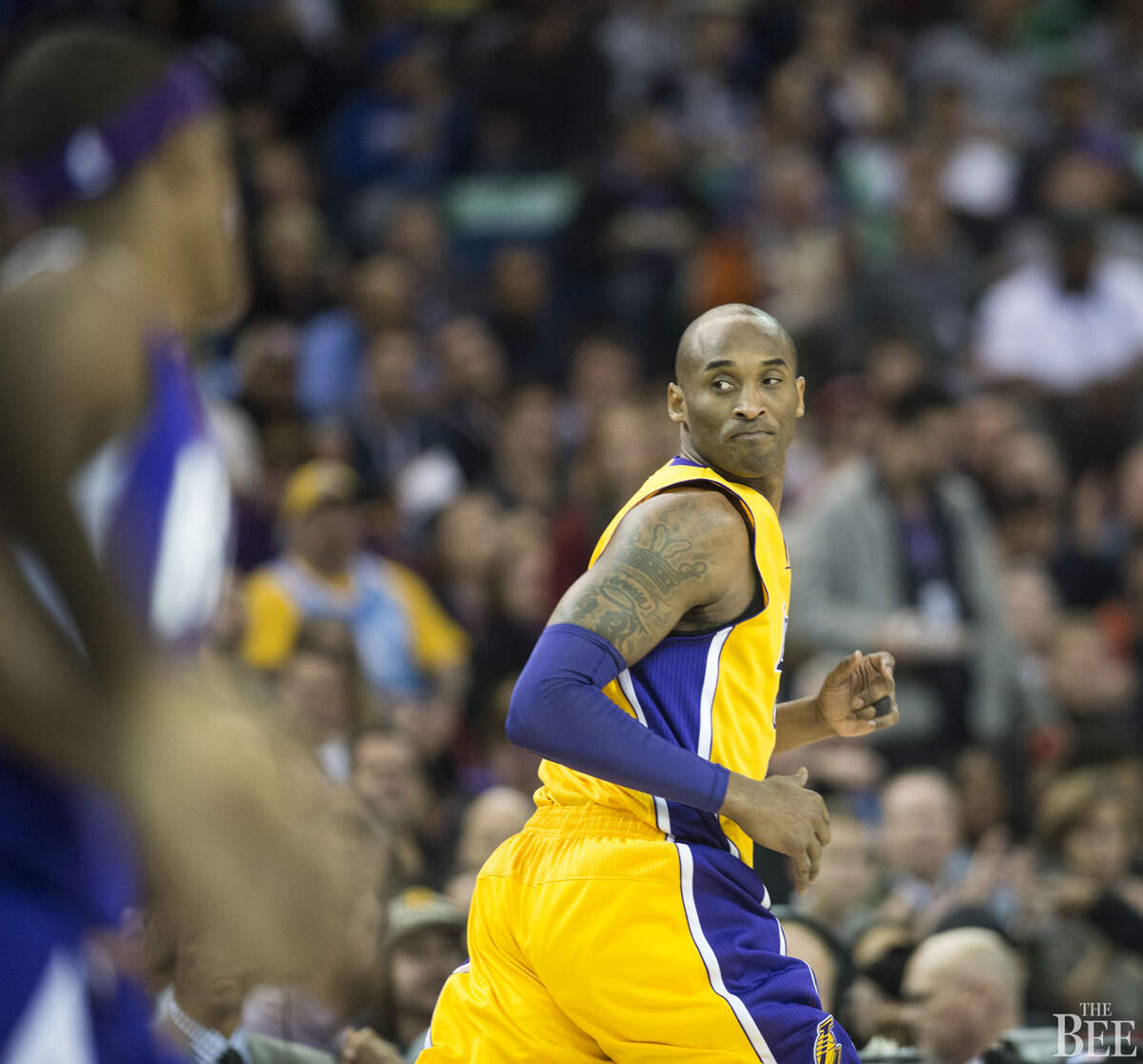 Los Angeles Lakers forward Kobe Bryant (24) looks back after a Sacramento Kings basket against the Lakers.