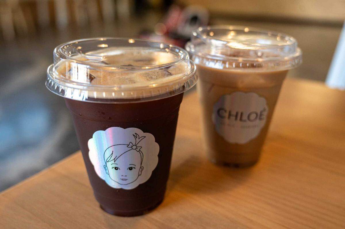 The Shaken Pho Americano and Earl Grey Espresso Latte are available at Chloe Ca Phe in midtown on Tuesday, July 8, 2025. The Americano is made with roasted cardamom and cinnamon infused syrup, echoing the spice base of pho broth.