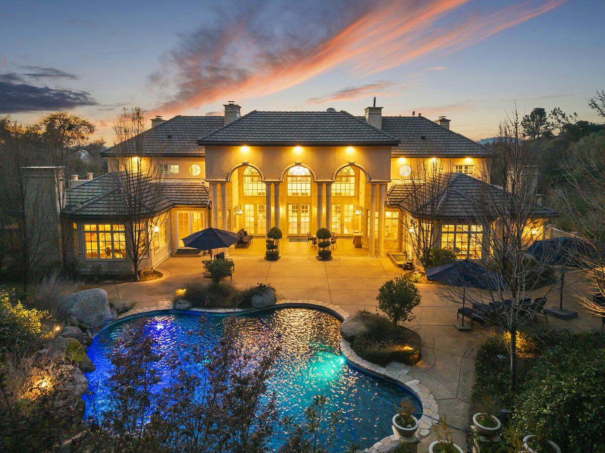 The sprawling mansion sits on nearly six acres with a pool, spa, theater and Savant automation, and is listed for nearly $5 million.