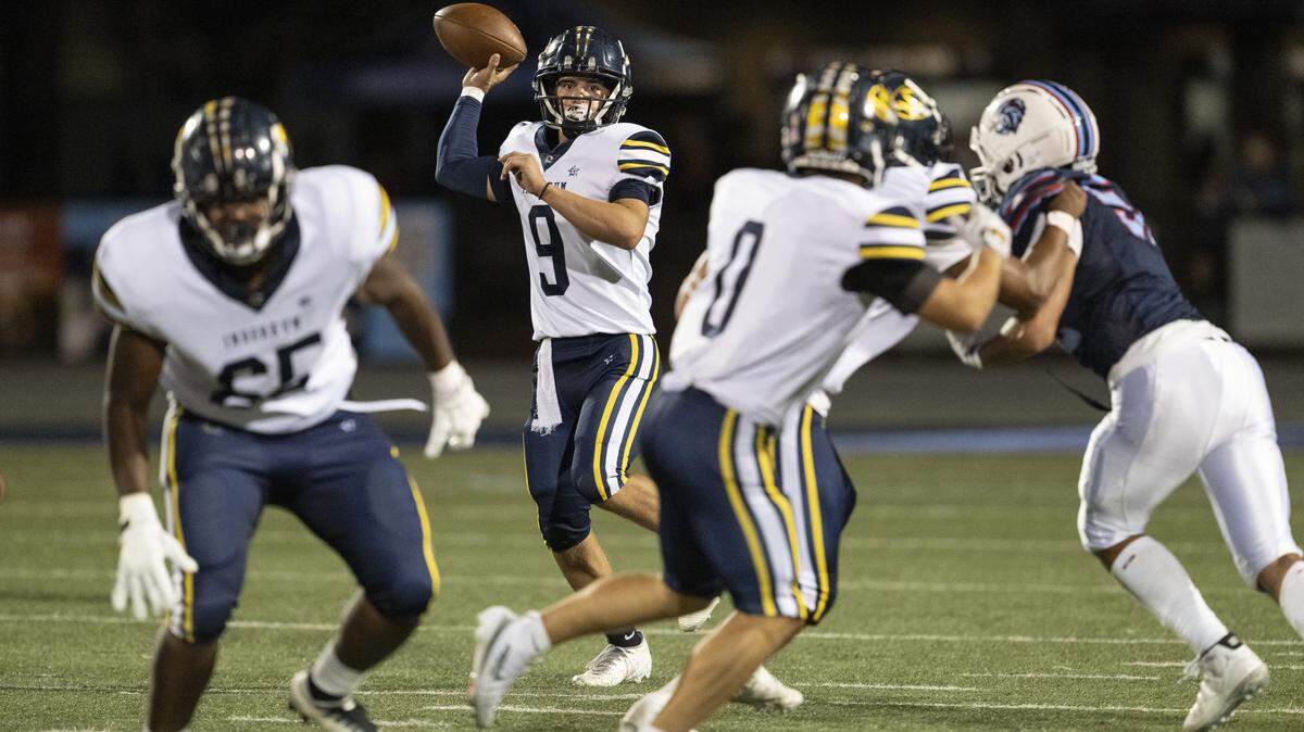 Inderkum Tigers quarterback Brody Cole (9) throws a pass against Destiny Christian Academy in Rosemont on Friday