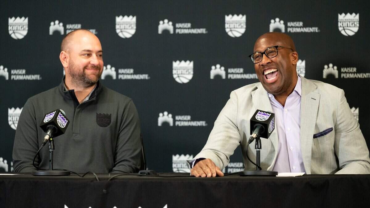 Sacramento Kings new head coach Mike Brown joke with GM Monte McNair during media press conference at the Golden 1 Center in Sacramento, Tuesday, June 21, 2022.