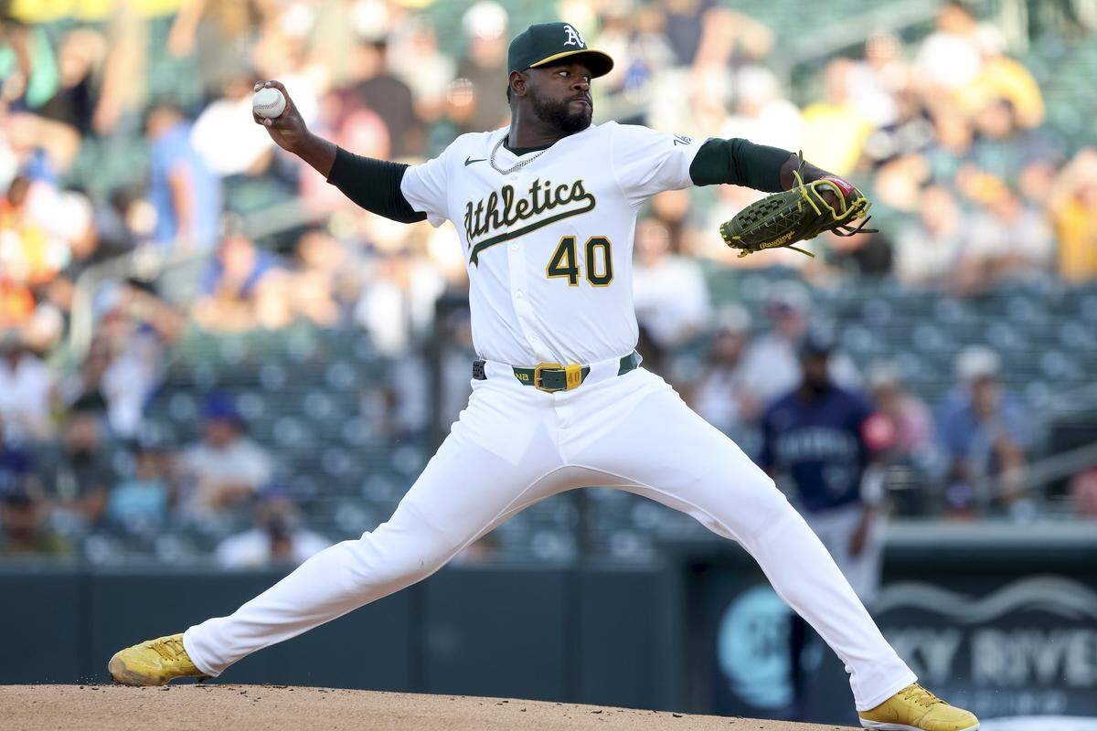 Athletics starting pitcher Luis Severino throws a pitch against the Seattle Mariners during the first inning Tuesday  at Sutter Health Park in West Sacramento.