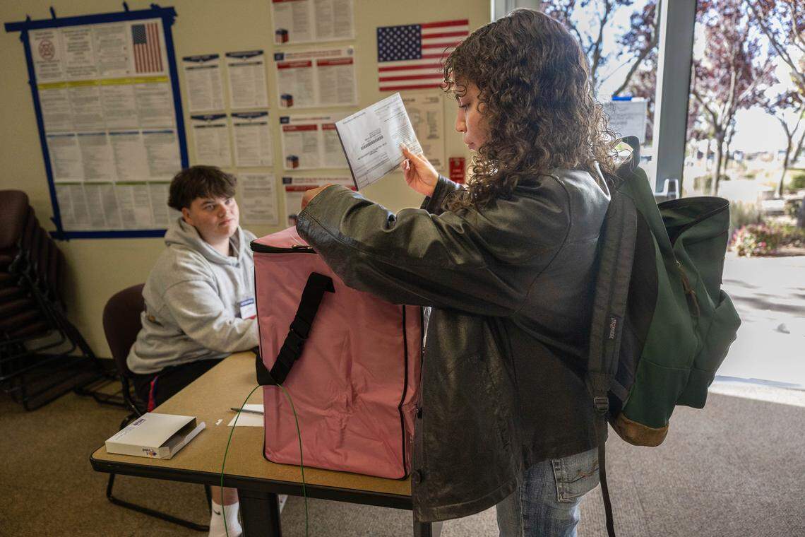 Tapanga Tayaba, of Sacramento, drops off her ballot at Folsom Lake College on Tuesday, Nov. 4, 2025.