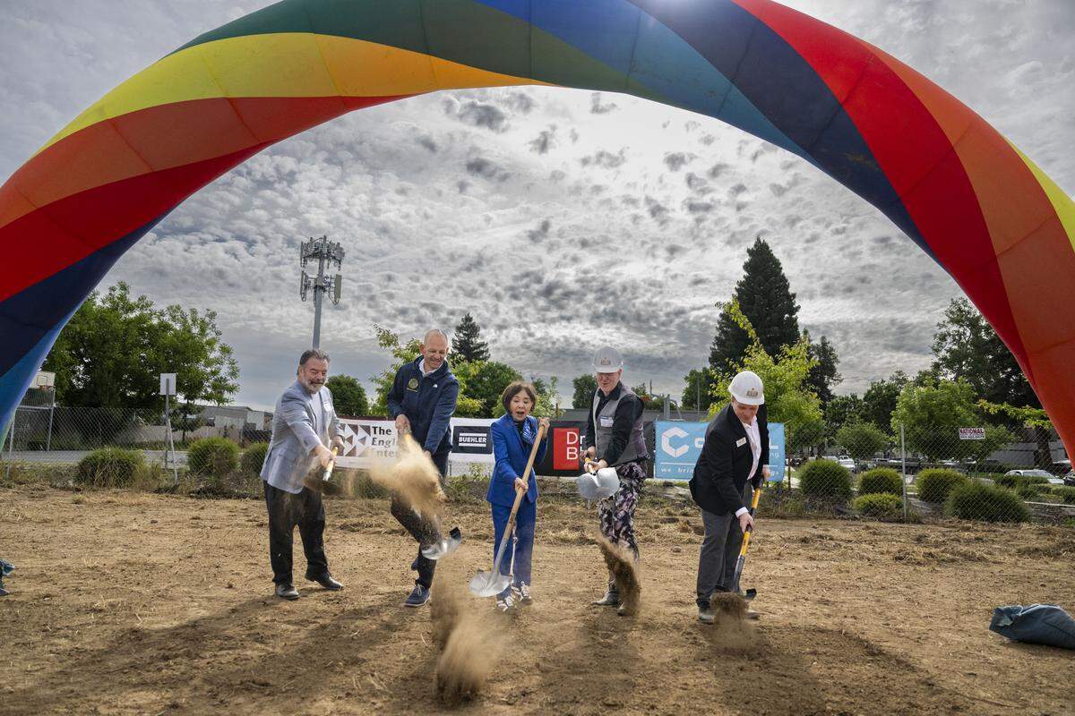 From left, Barry Broome, CEO of Greater Sacramento Economic Council; Sacramento Mayor Kevin McCarty; Rep. Doris Matsui, D-Sacramento; Devin Strecker, River District Executive Director; and Sam Greenlee, Alchemist CEO, shovel dirt during the groundbreaking of Alchemist Public Market in Sacramento’s River District on Thursday.
