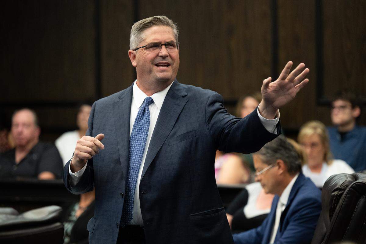 Attorney David D. Fisher talks on Friday with the Benson’s family attorney Dustin Collier during plea deal arguments for administrator Cindy Keller, principal Staranne Meyers and teacher Kimberly Wohlwend of the now-closed Guiding Hands School in the 2018 restraint death of a student, Max Benson, at the El Dorado Superior Court in Placerville. 