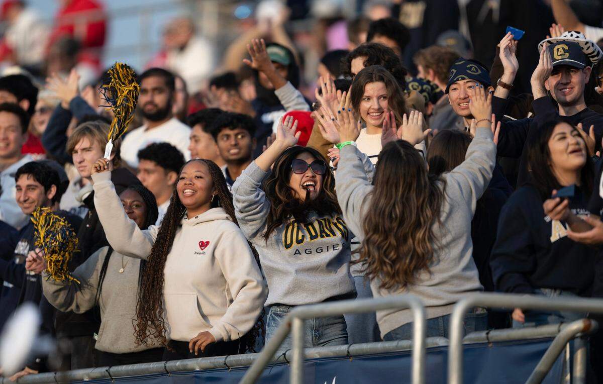 Fans cheer and celebrate FCS playoffs second-round game on Saturday, Dec. 7, 2024, at UC Davis Health Stadium in Davis.