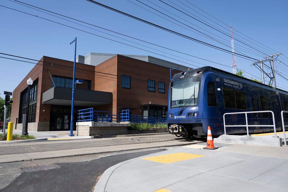 A light rail train leaves its stop front of Channel 24 in midtown Sacramento on Wednesday, the day before the music venue hosts its first concert.