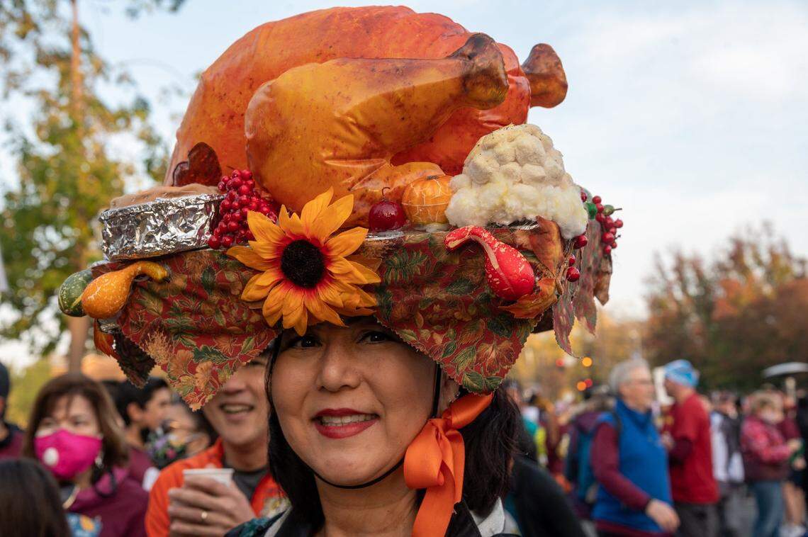Hillary Sunada, of Sacramento, said her hat was getting heavy – so she might not be able to add anymore food – as she celebrated Thanksgiving Day at the 28th annual Run to Feed the Hungry on Thursday.