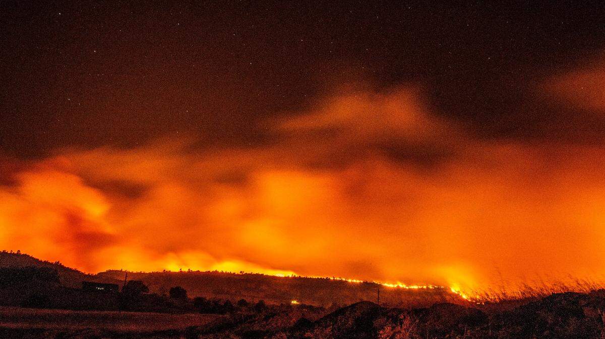 The Camp Fire burns as it lights up the sky under bright stars on Thursday, Nov. 8, 2018 near Pentz Rd. Paradise was evacuated and most of the homes were destroyed by the fire.