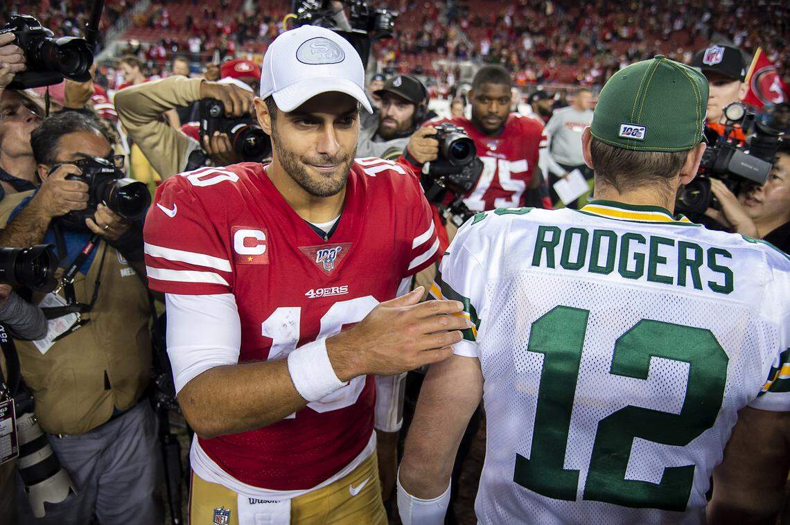 San Francisco 49ers starting quarterback Jimmy Garoppolo (10) and Green Bay Packers starting quarterback Aaron Rodgers (12) meet after the game at Levi’s Stadium on Sunday, November 24, 2019 in Santa Clara.