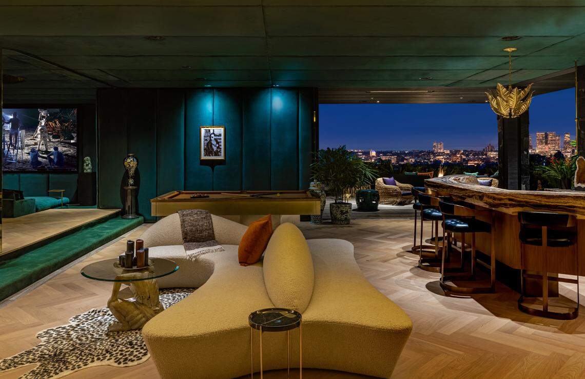 There are surprises in the six-bedroom, 10-bathroom estate, including a private speakeasy night ​club and over-the-top views of downtown Los Angeles.