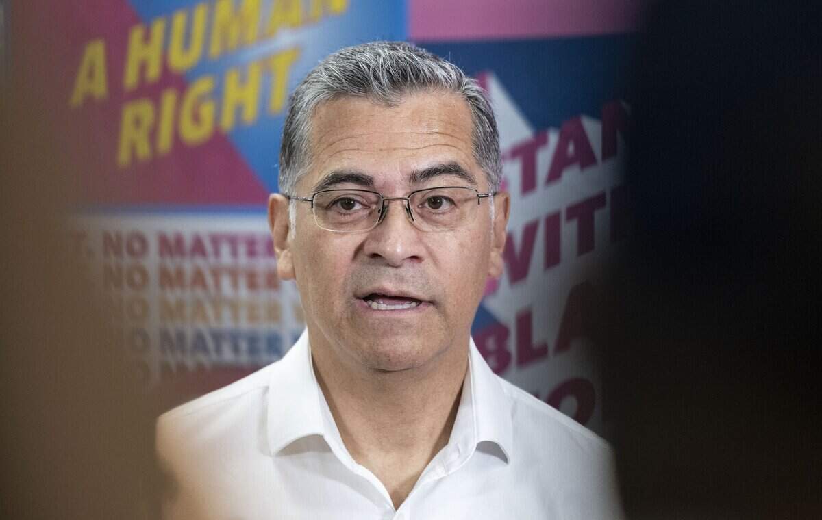 Democratic gubernatorial candidate Xavier Becerra speaks with volunteers and supporters at the Planned Parenthood office in Sacramento on Monday, the day before the election. Becerra finished second in the primary on Election Night.
