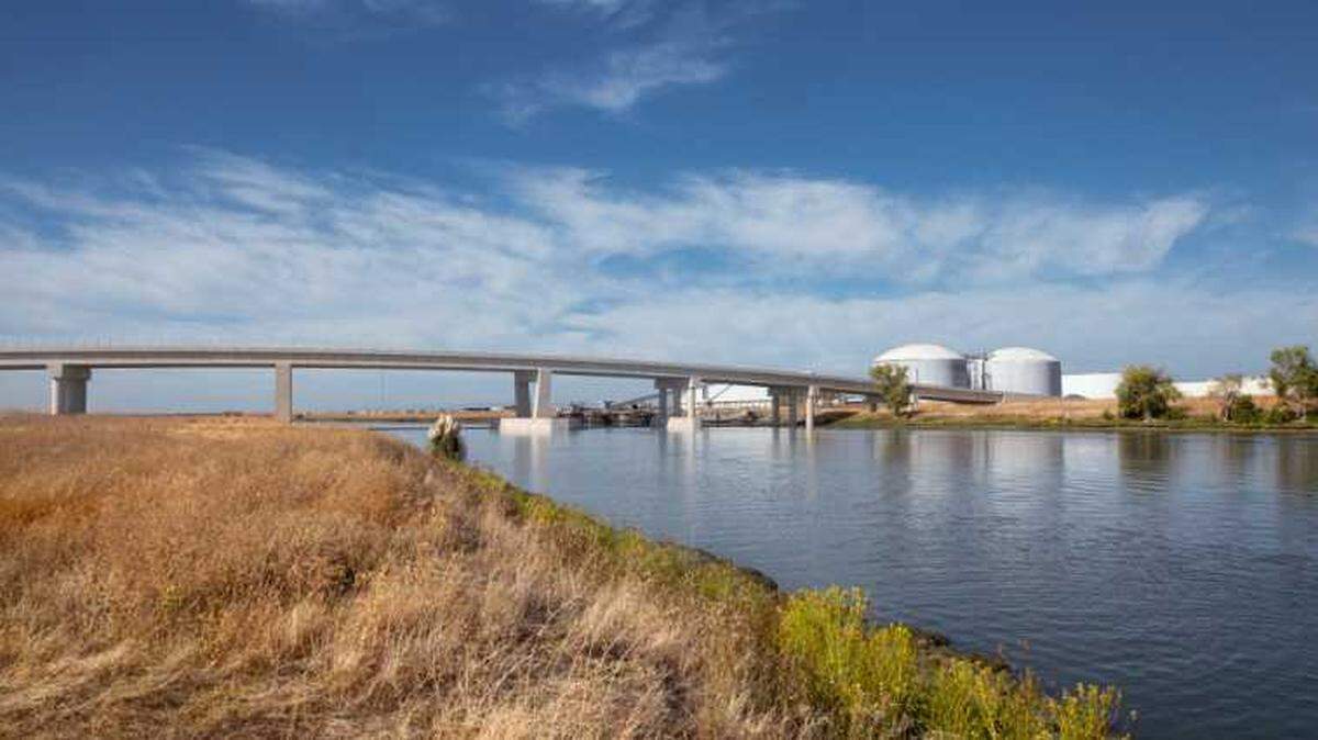 A rendering shows a low fixed bridge for West Sacramento.
