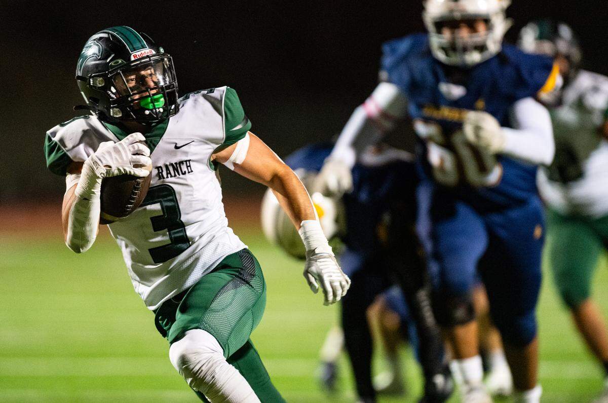 Liberty Ranch Hawks running back Joe Lara (3) bolts for a touchdown in the first half against the Rosemont Wolverines in Rosemont in October.