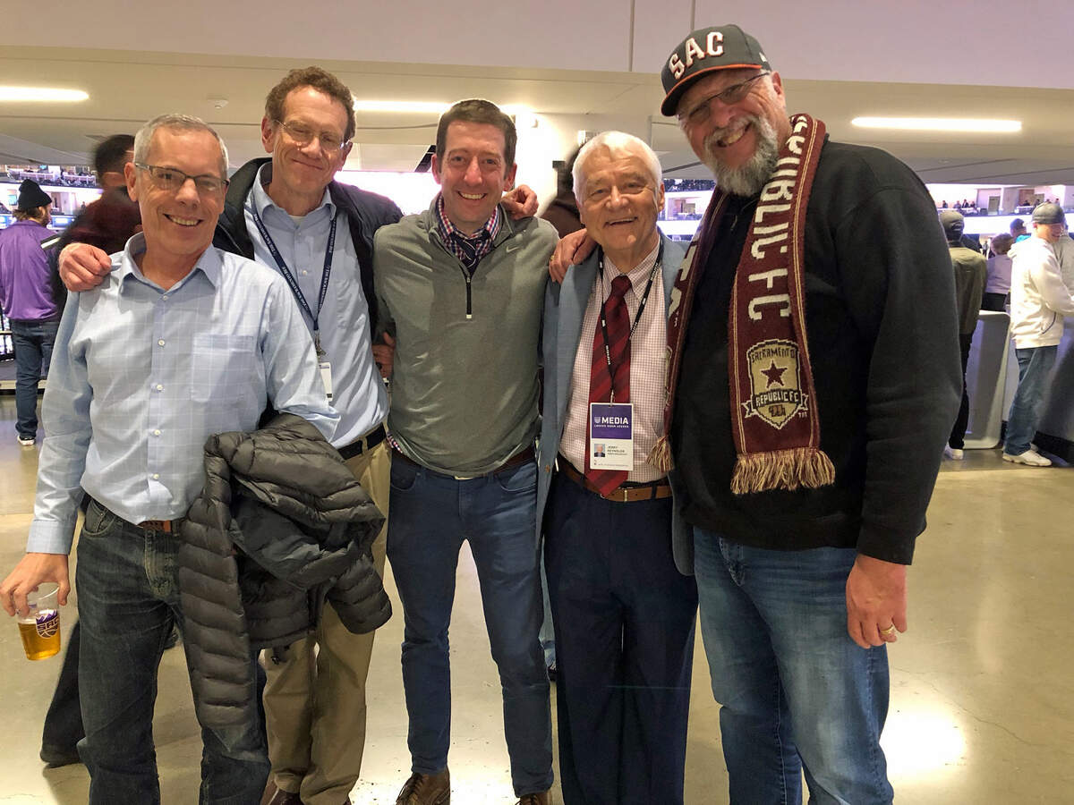 Sacramento Bee reporters Tony Bizjak and Dale Kasler, with their editor Ryan Lillis, join columnist Marcos Bretón (right) posing for a Golden 1 Center fan moment with the Kings’ Jerry Reynolds in December 2018.