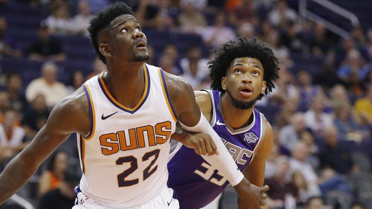Phoenix Suns center Deandre Ayton had the better statistics against Kings forward Marvin Bagley III on Monday at Talking Stick Resort Arena, but the visitors left with a 106-102 victory.