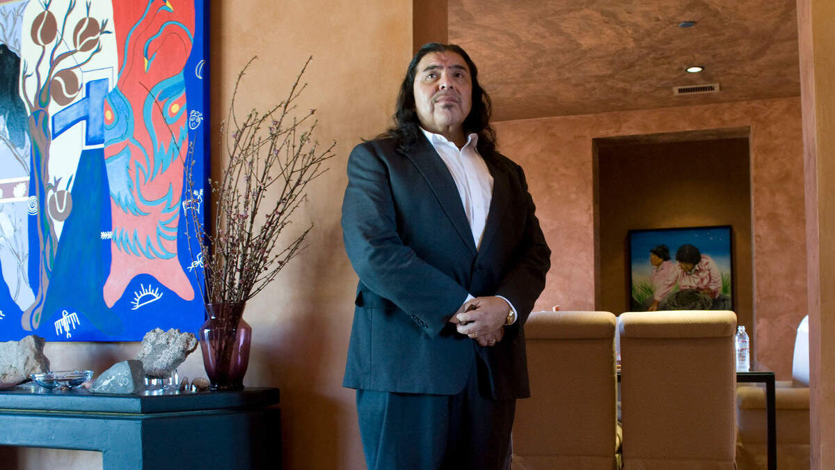 Marshall McKay, chairman and CEO of the Rumsey Band of Wintun Indians, stands amid his collection of cultural items at his home in Capay on Sept. 9, 2008.