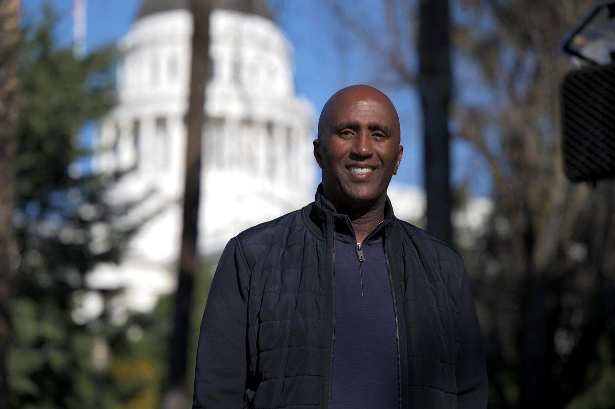 Assemblyman Jim Cooper, D-Elk Grove, stands outside the state Capitol on Wednesday, Feb. 9, 2022. Cooper is announcing Thursday that he is running for Sheriff of Sacramento County.