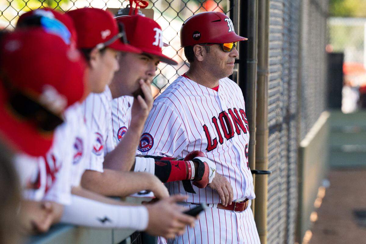 McClatchy Lions baseball coach Michael de Necochea watches his team take an early lead against the Grant Pacers on Friday after a ribbon-cutting ceremony to celebrate the grand opening of Church Field at the Sacramento high school.