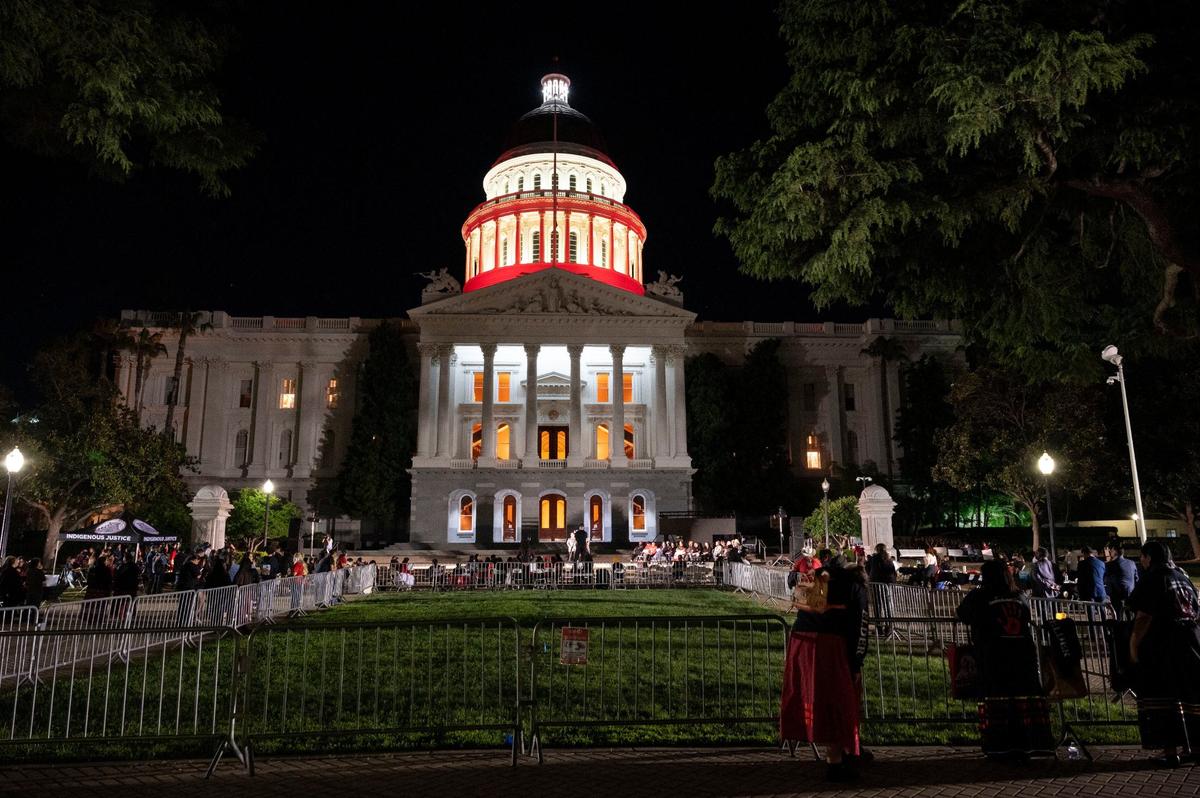 The Capitol in Sacramento is lit red for an event Wednesday, May 1, 2024, for National Missing and Murdered Indigenous People awareness month.